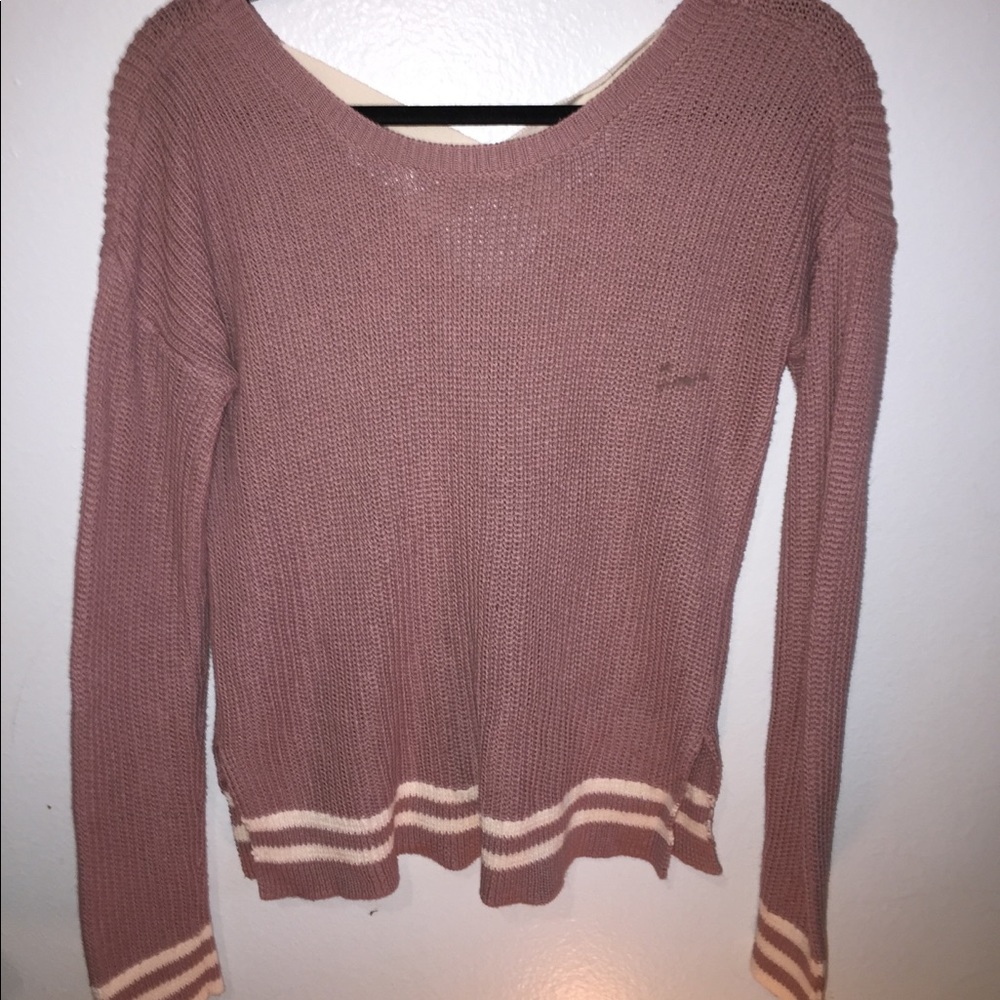 Pink and white sweater with crossed back